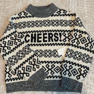A new day cashmere like Cheers sweater.  Size XL